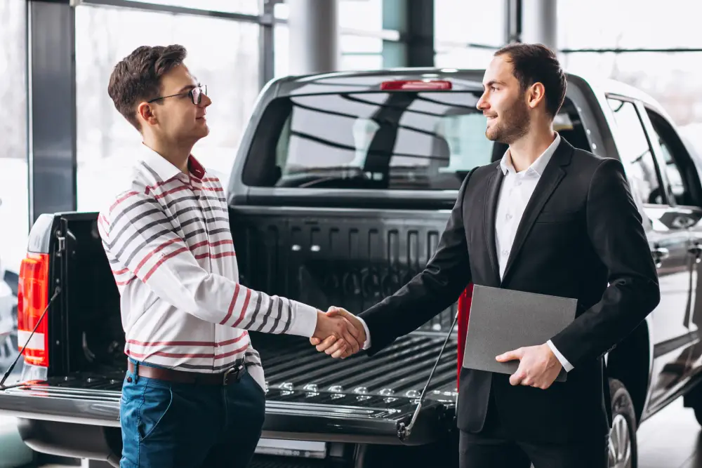auto dealer marketing system helping salesperson close a vehicle sale
