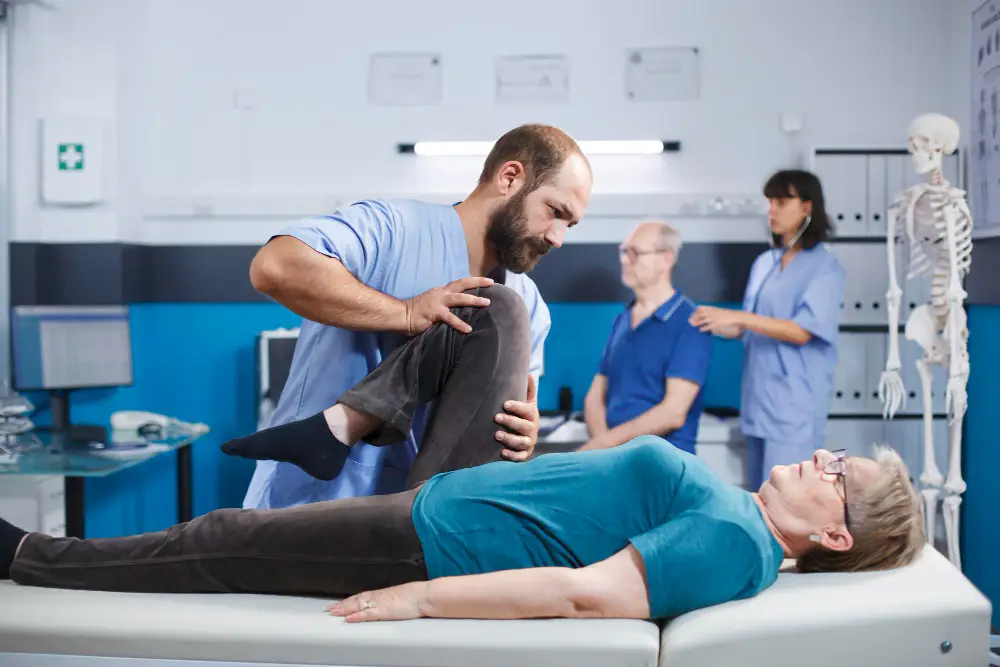 chiropractor performing treatment on patient inside clinic setting